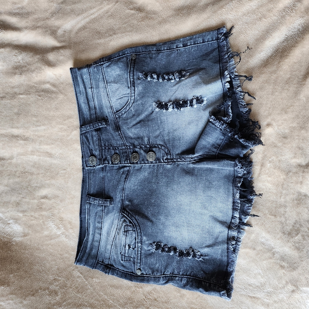 Light Blue Distressed Jeans with Frayed Hem